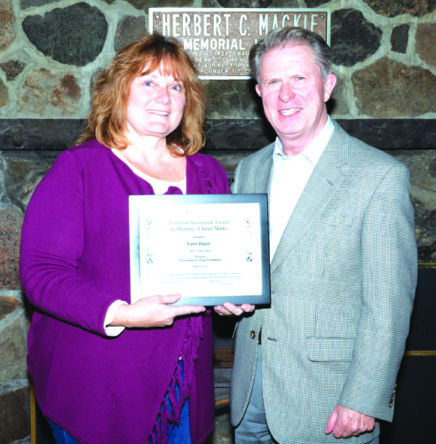 Karen Begier receives the Poummit Secretarial Award